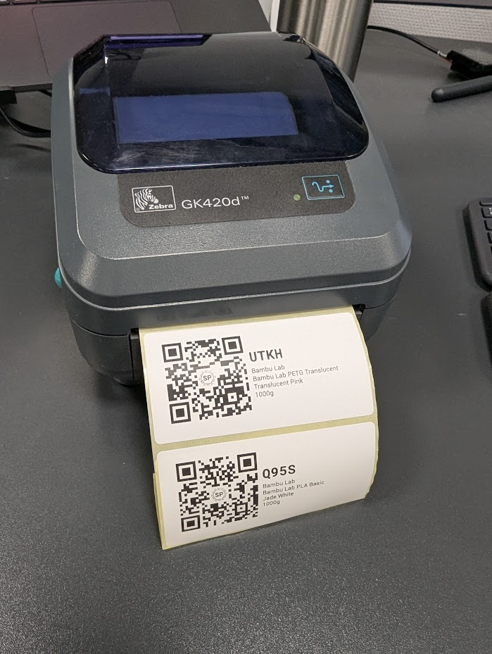 Zebra GK420d printer with freshly printed filament labels
